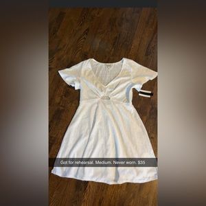 Medium dress altard state. Never worn